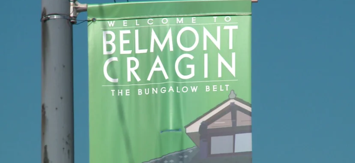 Close up photo of a pole banner that reads 